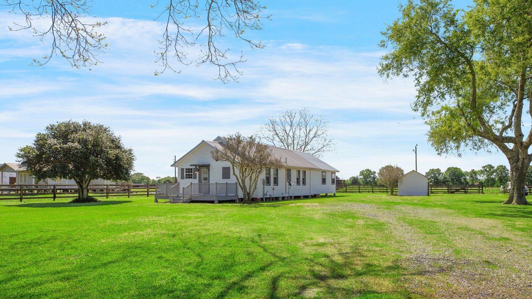 1236 Highway 742 in Opelousas, showing the home and surrounding rural property